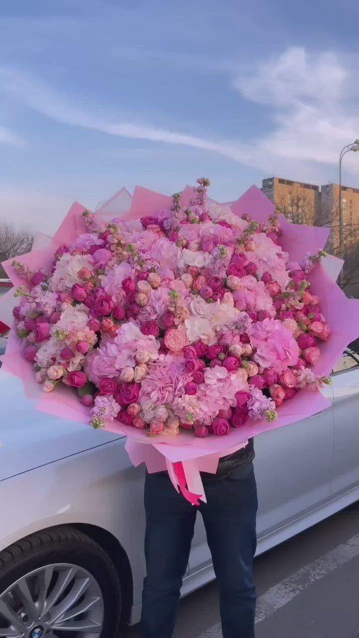 Corporate meeting room with carefully timed floral arrangements that maintain elegance throughout business hours